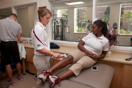 Photo of student receiving physical therapy
